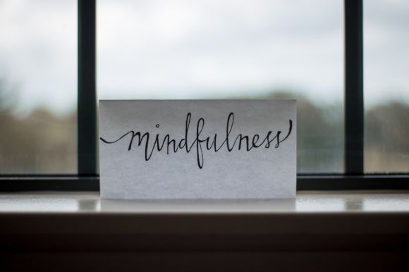 Ehuman Mind - mindfulness printed paper near window